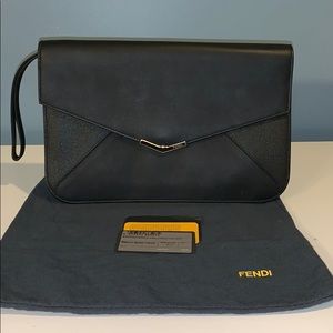 Fendi black clutch with gold hardware